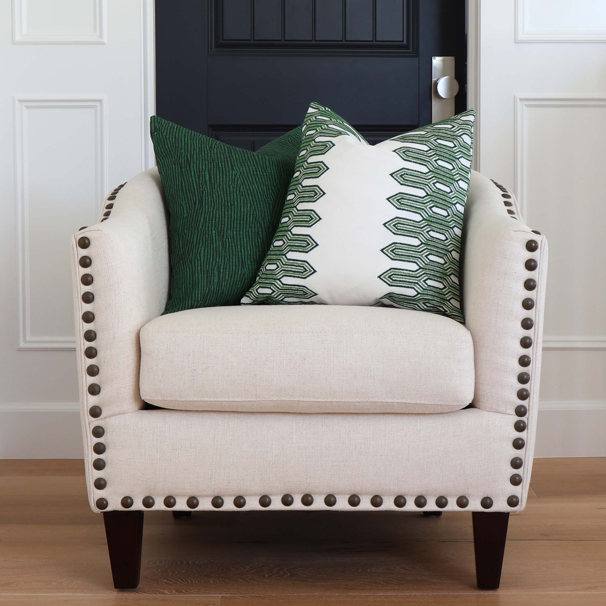 https://www.chloeandolive.com/cdn/shop/products/Thibaut-Nola-Stripe-Embroidery-W720808-Green-Geometric-Designer-Luxury-Decorative-Throw-Pillow-Cover-on-Club-Chair-in-Home_5000x.jpg?v=1651854588