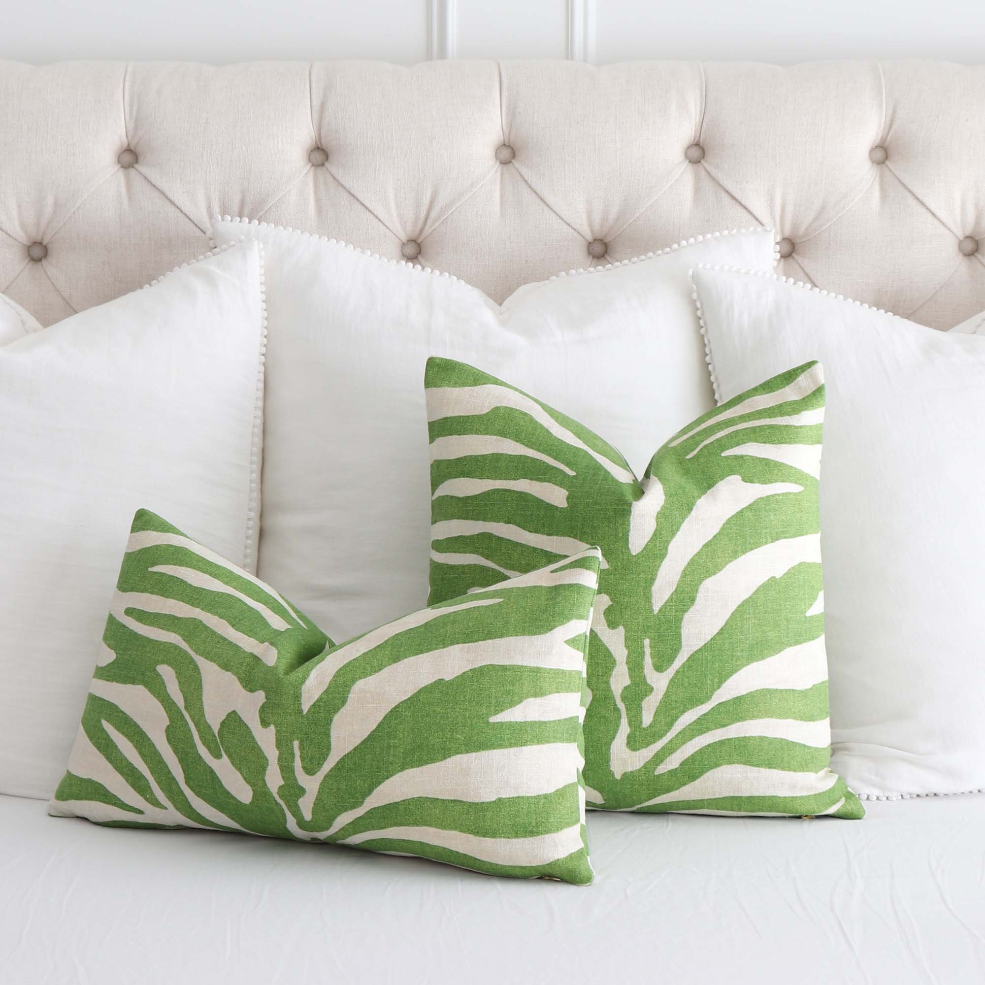 https://www.chloeandolive.com/cdn/shop/products/Thibaut-Serengeti-Zebra-Green-Designer-Luxury-Decorative-Throw-Pillow-Cover-F985030-with-white-euro-pom-pom-shams_5000x.jpg?v=1617993739
